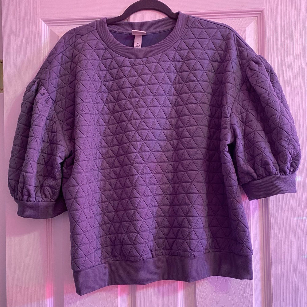 Purchased from Target A.  new day blue short sleeve sweatshirt